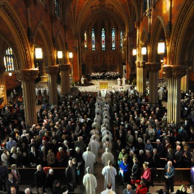 The processional walks to the altar of the Cathedral of the Immaculate Conception at the beginning of a rededication mass following extensive renovations to the interior and exterior of the 158 year old building, in Albany NY Sunday  afternoon November 21, 2010.  ( Philip Kamrass / Times Union )